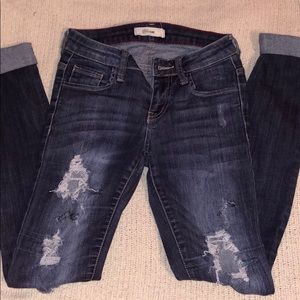 Dark blue ripped jeans